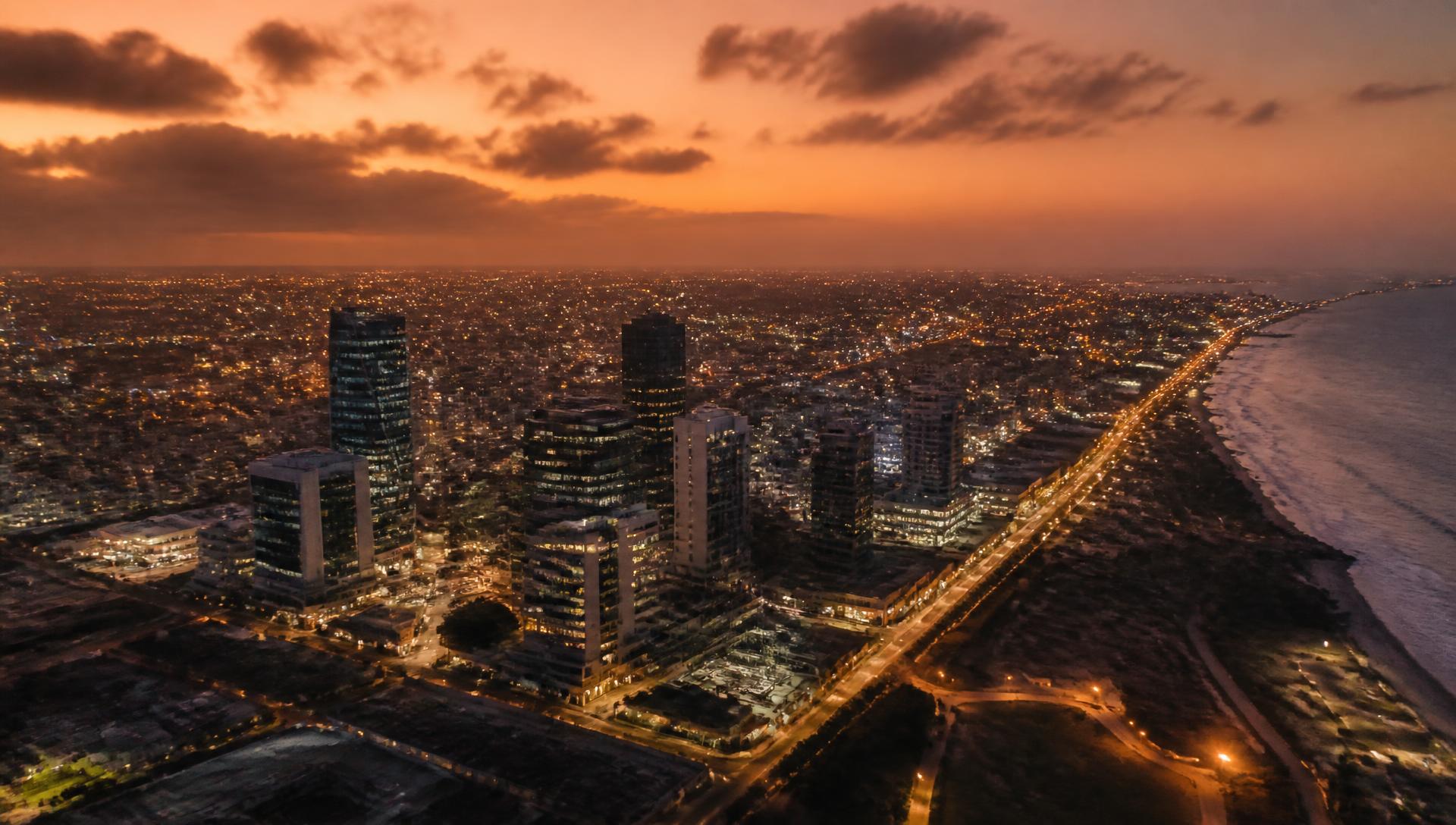 Accra skyline at dusk, PC Empire's operating base